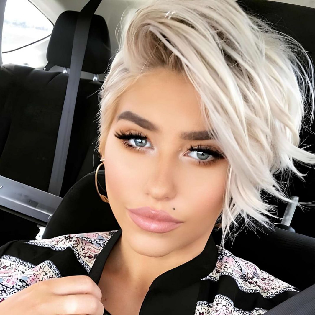 Voluminous Platinum Blonde Pixie with Side Part